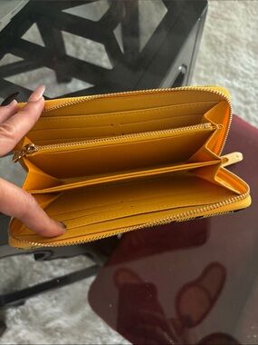 Source Unknown Bright Yellow Zip-Around Wallet is labeled LV